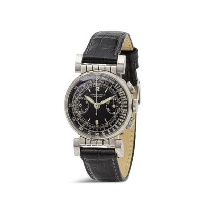 une photo d'une montre-bracelet avec un cadran noir et un bracelet en cuir noir