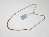 a close up of a gold chain with a tag on it