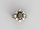 a sapphire and diamond cluster ring