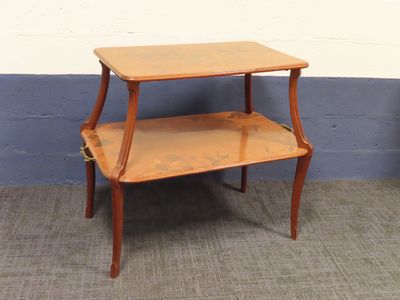 a small wooden table with a shelf on top of it