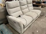 a couch that is sitting in the middle of a room