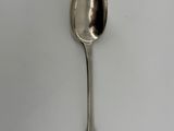 a spoon that is sitting on a table