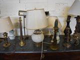 a lot of lamps that are sitting on a table