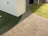 many computers on the desks in this office