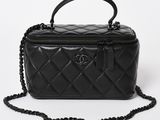 chanel black quilted leather mini vanity case