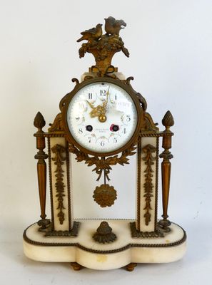 a clock that is sitting on top of a table