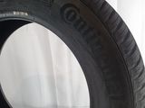 a close up of a tire on a white surface with a white background