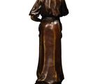 an image of a statue of a woman in a long dress