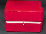 an image of a red box sitting on top of a table