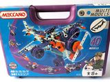 a box of legos with a toy airplane in it