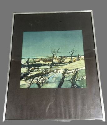 tableau encadré représentant un paysage enneigé avec une maison au loin