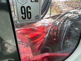 a picture of a close up of a vehicle ' s rear view mirror