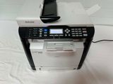 a printer that is sitting on top of a table