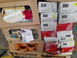 a carton of boxes with various items on top of it