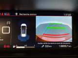 a picture of a car ' s dashboard with a camera on it