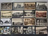 an old photo of a bunch of old photos hanging on a wall