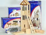 a wooden building set that includes a horse stable, a ladder, and a box