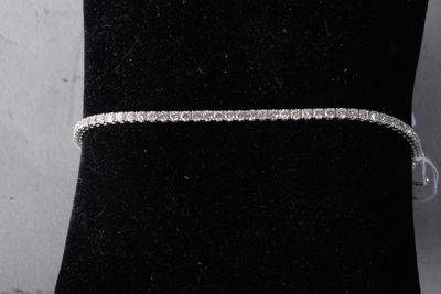 a close up of a bracelet on a mannequin