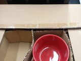 a box with a red cup inside of it and a box with a red cup inside of it