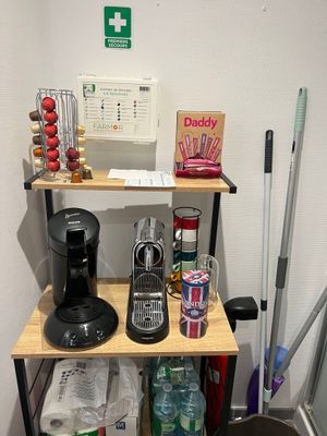 a shelf that has various items on it in a room