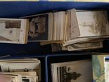 a blue box filled with old photos and old books