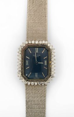 Montre pour dame en complet or blanc 18 carats de marque Favre-Leuba s