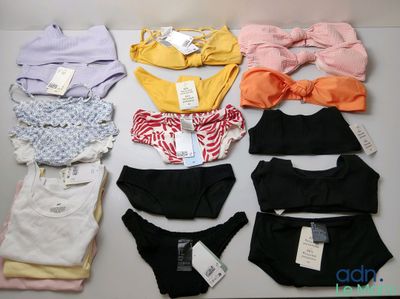 many different types of underwear laid out on a table