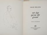 an open book with a drawing of a man in a suit and tie
