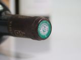 a close up of a bottle of wine on a counter