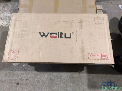 a box that is sitting on top of a carton