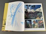 a book with a drawing of a man in a hat
