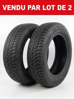 a pair of tires on a white background with the words vendu par lot de 2