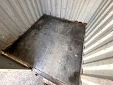 a metal box that has a metal door in it