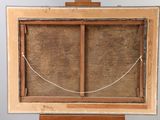 an old wooden easel with a piece of wood on top of it