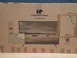 a cardboard box with a picture of a television inside of it