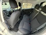 two seats in the back of a car that are empty