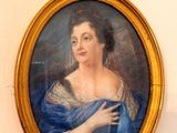 painting of a woman in a blue dress holding a blue shawl