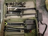 a lot of tools in a bag on a table