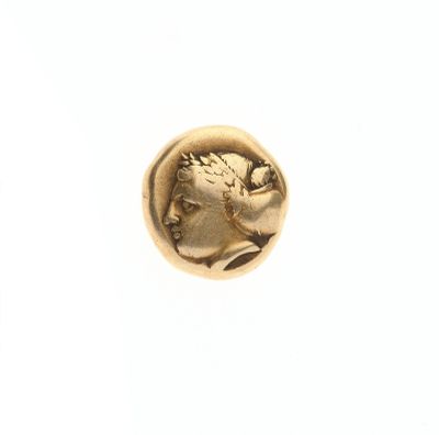 une pièce d'or représentant la tête d'un homme de profil
