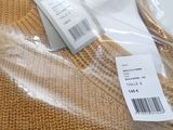 the sweaters are wrapped in plastic and ready to be shipped