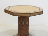 an image of a wooden table with a white top and a brown base