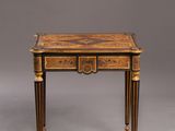 a small table with two drawers and a drawer underneath it