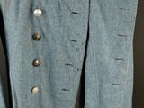 an image of a blue coat on a mannequin mannequin