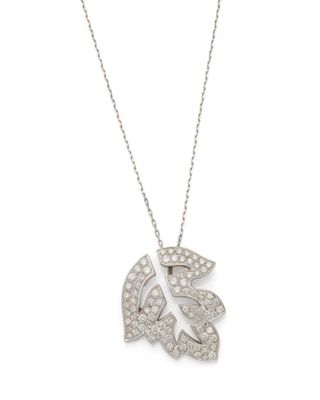 un pendentif en forme de feuille en or blanc et diamants