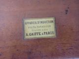 a sign on the side of a wooden table