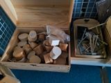 a wooden box filled with wooden pegs and a wooden box filled with wooden pegs