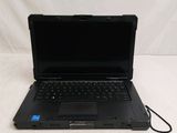 a black laptop computer sitting on a white surface