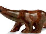 sculpture of a brown bear on a white background