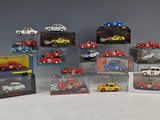 a lot of toy cars that are in a display case