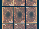 six square tiles with a black hole in them on a blue background